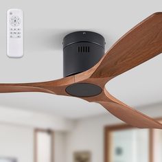 a ceiling fan with a remote control attached to it