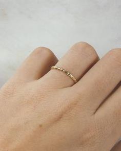 Solid Gold Textured Dainty Band – Lacee Alexandra Jewelry Minimalist Hammered Midi Rings For Anniversary, Elegant Hammered Midi Rings For Wedding, Minimalist Hammered Stackable Rings In Recycled Gold, Dainty Hand Forged Gold Stackable Rings, Dainty Hand Forged Yellow Gold Rings, Dainty Hand Forged Rings For Everyday, Dainty Hand-forged Rings In Recycled Gold, Hand Forged Dainty Rings In Recycled Gold, Hand Forged Recycled Gold Dainty Rings