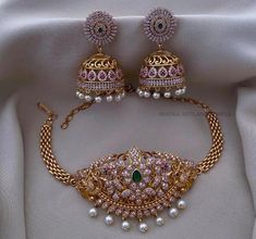 Sabyasachi Inspired South Indian Style Gold Finish Choker Set with Pearls and American Diamond Stones - Ruby Red & Emerald Green set includes Jhumki earrings Unique Choker Necklaces, Indian Dress Up, Diamond Necklace Indian, Long Blouse Designs, Diwali Pictures, South Indian Style, Engagement Necklaces, Kundan Jewellery Set, American Diamond Jewellery