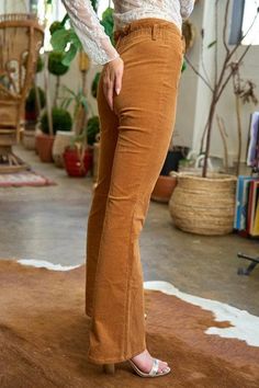 Get your flare-on with these Jane Corduroy pants from Jade! They're the ultimate in stylish comfort (and who doesn't love a good pun?). So go ahead, flaunt your style and comfort in these quirky, playful flares. High-waist elasticized backband Available in Black and Camel Stretched corduroy fabric Tab button closure Belt loops Flared silhouette Imported Corduroy Flare Pants, Platform Flats, Flying Monkey Jeans, Corduroy Fabric, Judy Blue Jeans, Plus Size Swimwear, Sweater Blouse, Glasses Accessories, Corduroy Pants