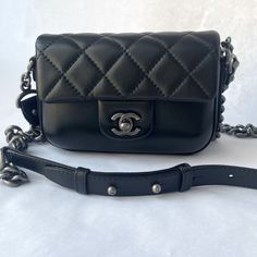 Chanel Mini Flap Bag, Black With Adjustable Cross Body Chain/Leather Strap And Top Handle. 7 1/2” X 5 1/2” X 2” 46 1/2” Cross Body Strap Designer Bags With Chain Strap And Double Flap, Black Everyday Luxury Satchel Shoulder Bag, Black Shoulder Bag For Formal Occasions, Designer Rectangular Flap Bag For Everyday Luxury, Designer Double Flap Bags With Branded Hardware, Designer Black Box Bag With Branded Hardware, Classic Black Flap Bag For Shopping, Designer Black Leather Box Bag, Black Evening Flap Bag With Branded Hardware