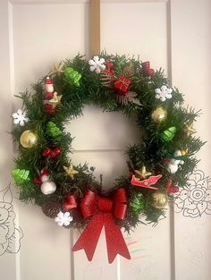 Handmade wreath for Christmas. Made to order and can theme it as you wish just message me details after purchase. Made in 2 different sizes a 13 inch small and 16 in large. Wreath With Ornaments, Handmade Garland, Wreath For Christmas, Garland Wreath, Christmas Decorations Diy Outdoor, Christmas Decorations Diy, Xmas Wreaths, Handmade Wreaths, Door Wreath Hanger