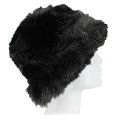 Add a touch of luxury to your winter wardrobe with the Women's Couture Gems Faux-Fur Bucket Hat. Designed with plush, high-quality faux-fur, this elegant bucket hat offers both warmth and a statement-making style. Whether you're strolling through the city or attending a chic outdoor event, the Women's Couture Gems Faux-Fur Bucket Hat is the ultimate blend of cozy comfort and sophisticated fashion, ideal for making a stylish impression all season long. bucket hat design faux-fur exterior adjustable headband with interior tie-strings, one size fits most 100% polyester hand wash cold Faux Fur Bucket Hat, Fur Bucket, Fur Bucket Hat, Bucket Hat Design, Sophisticated Fashion, Watch Trends, Hat Design, Outdoor Event, Shoe Show