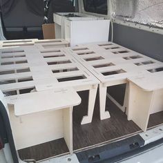 the back end of a van that has been made to look like it is being built