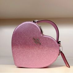 Beautiful Metallic Pale Pinkish Purple Heart Shaped Bag. Coach Leather Statement Purse. Love And Valentine's Day. Treat Yourself Coach Heart Bag, Lilac Heart, Coach Bucket Bag, Statement Purse, Heart Shaped Bag, Coach Crossbody Purse, Pinkish Purple, Purse Fashion, Heart Bag