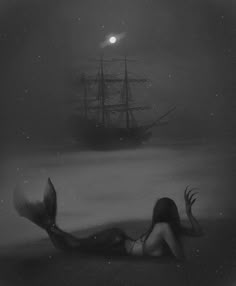 a black and white photo of a mermaid in front of a ship on the ocean