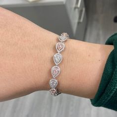 4.68 Carat total weight Natural fancy pink and white pear shapes F/G color white diamonds VS1-SI1 clarity Set in 18K White Gold 7 inches Exceptional Craftsmanship Pear Bracelet, Pear Shapes, Diamond Stacks, Diamond Education, Pear Shaped Diamond, Best Diamond, Fancy Color Diamonds, Pink Diamond, Pear Cut