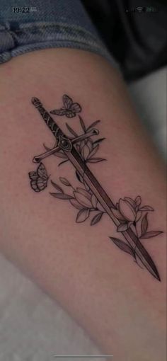 Swords With Flowers Tattoo, Book Inspired Spine Tattoos, Spine Tattoos For Women Unique, Sjm Tattoos, Flower Vine Tattoo, Flower Vine Tattoos, Thorn Tattoo, Shield Tattoo