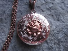 Beautiful rose gold plated round locket, I also have this in heart shaped, so please do browse my shop. AMAZING DETAILS The locket has been professionally plated with a gorgeous shiny pink 24k rose gold and an ultracoat has been added to protect finish and to add durability. The plating process has been done with high quality materials and processes. It is completely lead and nickel free and manufactured in the United States. The locket is Victorian style with beautiful etching on the front and Rose Gold Medallion Necklace For Wedding, Rose Gold Engraved Jewelry For Wedding, Engraved Rose Gold Jewelry For Weddings, Engraved Rose Gold Wedding Jewelry, Rose Gold Locket Necklace For Anniversary With Round Pendant, Rose Gold Locket Necklace For Anniversary, Rose Gold Locket Necklace For Formal Occasions, Elegant Rose Gold Locket Necklace For Mother's Day, Elegant Rose Gold Locket Necklace For Valentine's Day