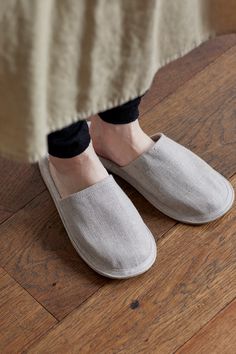 Fog Linen Slippers Breathable linen and luxe leather bottom's make these slippers perfect for cruising around the house. Simple, functional, and comfortable, the sizing is unisex, M or L. Be sure to measure your foot before ordering. medium: 10.25" interior footbed large: 0.75" interior footbed 100% linen uppers/ suede leather solespot clean or hand-wash only Linen Slippers, House Simple, Fog Linen, Suede Leather, Final Sale, Slippers, Hand Wash, Leather