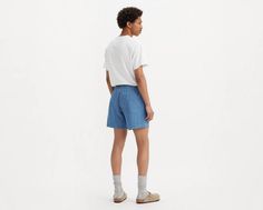 We took our XX Chinos and reinvented them as a pair of modern, roomy shorts. These XX Chino Easy Shorts feature an elasticized waist and keep you casually put together without looking like you tried too hard. A pair of modern, relaxed shorts Cut with extra room in the seat and thigh With an elasticized waistband and external drawstring Crafted with denim Features a 6-inch inseam Hold the H2O: This garment was made using recycled water, which helps us to reduce our impact on this finite resource Casual Levi's Shorts, Levi's Relaxed Fit Bottoms, Ribcage Jeans, Relaxed Jeans, Chino Jeans, Lightweight Dress, Loose Jeans, Tapered Jeans, Extra Room