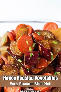 roasted vegetables with sesame seeds in a glass bowl