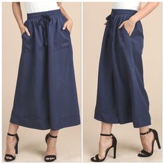 Restocked Amazing Quality. Model Wearing Actual Pants And They’re Not Altered In Any Way Ladies You’re Going To Fall In Love With These Pants. They’re Comfortable & Look Great On All Body Shapes. They’re Pants But At Times Look Like A Midi Skirt. They’ll Definitely Be Your Go To Pant. Dress Them Up Down & They Can Be Worn Through All Seasons Navy Blue 100% Tencel Elastic Waist Drawstring Super Wide-Leg Culotte Palazzo Trouser Cropped Pants With Side Pockets. Sizes Avail: Small, Medium & Large No Spring Denim Blue Bottoms With Side Pockets, Spring Denim Bottoms With Side Pockets, Spring Denim Blue Wide Leg Pants With Elastic Waistband, Denim Blue Bottoms For Spring Day Out, Denim Blue Bottoms For Day Out In Spring, Chic Spring Denim Bottoms, Spring Workwear Denim Blue Bottoms, Denim Blue Wide Leg Work Pants With Pockets, Denim Blue Wide Leg Pants With Pockets For Work