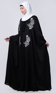 Essence Abaya is the simple, comfortable, easy and reliable breathable abayaA Proper Dress Is A Very Important Part Of Salah/Namaz. It Not Only Covers Us In A Proper Manner But It Also Relieves Us Of Consciousness Of Not Exposing The Awrah. The abaya Is Traditionally Worn Over Your Clothes For any occasion, Reading Of Quran Or Additional Modesty When In Groups. This Article Is Made Of Cotton Fabric Which Is Very Soft, Breathable, Light Weight And Easy To Maintain. It Gives A Good Fall To The Gar Black Maxi Length Thobe For Eid, Modest Black Kaftan For Eid, Black Abaya With Modesty Panel For Eid, Modest Black Thobe For Eid, Black Long Abaya With Modesty Panel, Kaftan Style, Patch Work, Hand Work, Embroidered Patch