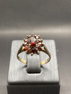 It is a Victorian style ring, estimated from 1980s, hallmarked, silver, faceted red garnet, the item in a good condition, the UK size O, the US size 7.1/4. Victorian Style Rings, Red Garnet Ring, Garnet Ring, Vintage Victorian, Garnet Rings, Multi Stone Ring, Red Garnet, Multi Stone, Victorian Style