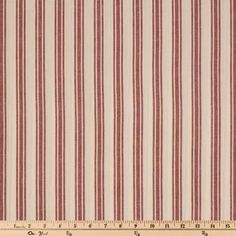 a red and white striped fabric with a ruler in front of the bottom half of it