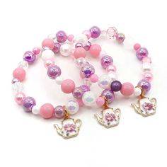 These adorable set of 10 bracelets is the perfect favor for your little one's tea themed party!  Each bracelet features an enameled floral teapot charm and an assortment of pink, orchid and white 6-10mm acrylic beads strung with durable stretch cord. Each bracelet comes individually packaged in organza bags.  Please message me if you have any questions.  * Estimated delivery dates are calculated by Etsy using the most optimistic conditions and are not guaranteed.  * The exact bead styles and sha Tea Themed Party, Tea Party Princess, Second Birthday Girl, Skate Party Favors, Princess Cottagecore, Bead Styles, Party Bracelets, Par Tea, Floral Teapot