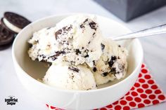 a bowl filled with ice cream and oreo cookies