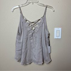 Astr The Label Lace Crisscross Sparkle Cami Size M Nwt Color: Taupe Purchased At Nordstrom Casual Summer Crisscross Tank Top, Casual Summer Tank Top With Crisscross Back, Casual Crisscross Tank Top For Summer, Spring V-neck Tops With Crisscross Straps, Spring Beach Tank Top With Crisscross Straps, Summer Crisscross Top For Vacation, Crisscross Top For Day Out In Spring, Vacation Tops With Crisscross Straps, Spring Cross-back Tops For Day Out