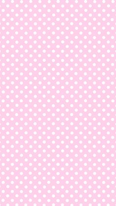 a pink background with white polka dots