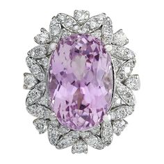 12.00 Carat Natural Kunzite 14 Karat White Gold Diamond Ring Stamped: 14K White Gold Total Ring Weight: 9.5 Grams Kunzite Weight is 11.00 Carat (Measures: 15.00x10.00 mm) Diamond Weight is 1.00 Carat Color: F-G, Clarity: VS2-SI1 Face Measures: 23.30x18.80 mm Sku: [703106W] Sapphire Anniversary Ring, Kunzite Ring, Sapphire Anniversary, 14k White Gold Diamond Ring, Gold For Sale, Purple Jewelry, Gold Diamond Ring, White Gold Diamond Rings, Gold Diamond Jewelry