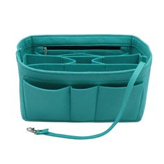 an aqua colored purse with multiple compartments