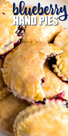 blueberry hand pies stacked on top of each other with the words, blueberry hand pies