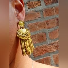 These Are Unique And So Boho Metal With Beautiful Rayon Tassels Abstract Boho Style They Hang 3 Inches Not Too Big Or Heavy These Are Very Lightweight On The Ear Beautiful Color Easy To Wear They Are One Of A Kind These Earrings Are A Classic And Natural Addition To Any Wardrobe Gold Earrings With Latkans For Summer, Gold Tassel Earrings With Dangling Beads For Festival, Traditional Gold Tassel Earrings For Festivals, Gold Tassel Earrings For Festivals, Gold Elegant Tassel Earrings For Festival, Elegant Gold Tassel Earrings For Festival, Traditional Gold Tassel Festival Earrings, Traditional Gold Fringe Jewelry, Bohemian Metal Tassel Earrings For Party