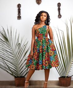 Ankara dress, super cute beautiful gown, look different  ,standout back zipper  Before ordering,kindly confirm your size from the size chart. If you wish to send your measurement, kindly send your Bust, Waist, Hips and Dress Length measurements.   or follow the YouTube link here to measure your self https://m.youtube.com/watch?v=_qe_J5Y_N_E It takes between 1-2 weeks to sew your dress and 3-5 business days to ship.   If you wish to place a custom order, kindly contact us. One Shoulder Ankara Dress, African Dresses Modern Beautiful, Kitenge Dress Designs Unique, Ankara Flared Dress, Wax Print Dress, Robes Wax, Kitenge Dress, Ankara Clothing, Ankara Dress Styles