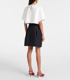 Crepe Couture miniskirt in black - Valentino | Mytheresa Elegant A-line Mini Skirt For Evening, Elegant A-line Skort For Work, Elegant A-line Skort For Workwear, Formal Mini Pleated Skort, Formal Mini Length Pleated Skort, Formal Mini Skirt For Summer, Elegant Short Cocktail Skirt, Structured Fitted Skirt For Evening, Formal Spring Mini Skirt