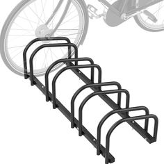 three bike racks are shown with wheels attached to them