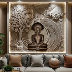 a living room with a couch and a buddha statue on the wall