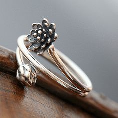 Delivery within 2-5 business days.   This Lotus ring represents various philosophical and religious views related to enlightenment.     🌟One of the Eight Auspicious Symbols of Buddhism, the lotus flower symbolizes purity and liberation. It is deeply rooted in muddy waters, but it blossoms above the mud and turns into Eight Auspicious Symbols, The Lotus Flower, Gem Rings, Lotus Flower Ring, Lotus Ring, Lotus Jewelry, Silver Ring Designs, Silver Rings Simple, Muddy Waters