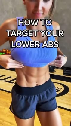 a woman standing on top of a basketball court with her arms out and the words how to target your lower abs