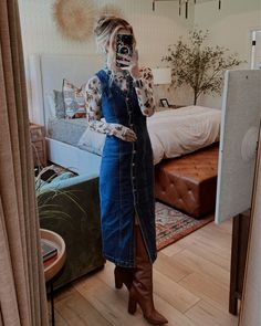 Denim V-Neck Midi Dress curated on LTK Denim Dress And Cardigan Outfit, Midi Jean Dress Outfit, Dress And Boots Work Outfit, V Neck Dress Layering, Cowboy Boots Outfit Modest, Overall Jean Dress Outfit, Modest Rodeo Outfits For Women, Long Jean Dress Outfit Winter, Denim Dress With Sweater