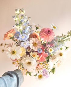 Whimsical Spring Bouquet, Weddings With Lots Of Flowers, Wildflower Wedding Bouquet Bridesmaid, Light Pink And Orange Wedding Flowers, Pink Wild Flower Bouquet, Blue Wildflower Wedding Bouquet, Wedding Bouquet Pink And Blue, May Wedding Flowers Bridal Bouquets, Pastel Floral Bouquet