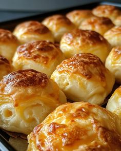 there are many rolls on the baking sheet