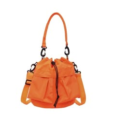 Multi-Pocket Drawstring Bucket Bag Width Height Thickness Handle Length 24 24 14 26 measurement is cm.Product Information Material: 100% Nylon Color: Black Wash care: Hand Wash, Wipe Clean Multi Pocket Bag, Utility Bag, Drawstring Bucket Bag, Orange Bag, Bag Shoes, Trendy Fashion Women, Hand Bags, Haiti, Ghana