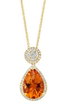 A warm citrine stone pendant, surrounded with glittering diamonds, conjures a firey statement to this delicate 14K gold necklace. 14K gold, diamonds, citrime Total diamond weight: 0.40 ctw 18" length Made in USA Luxury Gold Necklaces With Accent Stones, Fine Jewelry Orange Necklaces For Anniversary, Formal Yellow Gold Necklace With Accent Stones, Gold Necklaces With Accent Stones For Formal Occasions, Gold Pear-shaped Diamond Necklace With Gemstone, Formal Citrine Necklaces With Diamond Accents, Gold Diamond Necklace With Pear-shaped Gemstone, Orange Jewelry With Diamond Accents For Gift, Elegant Citrine Necklaces With Diamond Accents