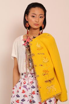 Yellow wool jacket with floral embroidery and natural silk lining. Embellished with Swarovski crystals. Each jacket is hand embroidered and one of a kind. Collection "MOON [mo:n]" is inspired by floral embroidery from Muhu, a small island in Estonia with great handicraft traditions.  Each flower, bird and animal embroidered on the jacket has their own symbolic meaning. This jacket will be made especially for you and according to your measurements. Please allow 2-4  weeks for creating it. We ship Traditional Embellished Spring Outerwear, Luxury Spring Outerwear With Floral Embroidery, Spring Wool Outerwear With Embroidery, Spring Wool Cardigan With Embroidery, Spring Embroidered Wool Cardigan, Wrap Jacket, Natural Silk, Small Island, Wool Jacket