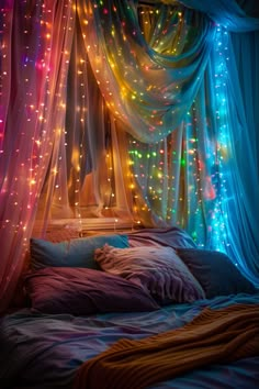 a bed covered in colorful lights next to a window with drapes on the sides