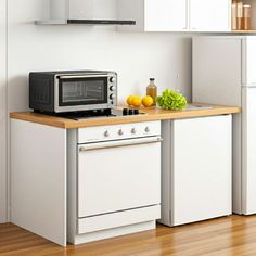 a microwave oven sitting on top of a wooden counter