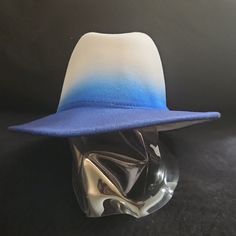 New Ombre Hat. Very Stylish. Never Worn. Casual Blue Fedora Hat, Casual Blue Fedora With Wide Brim, Casual Blue Wide Brim Fedora, White Fedora Felt Hat For The Beach, White Fedora Felt Hat For Beach, Casual Blue Fedora With Flat Brim, Casual Blue Brimmed Hat, White Felt Hat For Beach, Casual White Felt Hat With Curved Brim