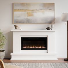 a white fireplace in a living room with a painting on the wall and a potted plant next to it