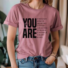 You are Kind Loved Brave Enough Shirt, Positive Quotes Shirt, Be Mindfulness Positive Vibes Only Tee, You Are Loved, Inspirational Shirt Printed using Direct to Garment - DTG printing method for comfort, durable and long-lasting. Chest Size Measurement :  S 34/37" M 38/41" L 42/45" XL 46/49" 2XL 50/53" 3XL* 54/57 Washing Care Instructions:  Machine wash warm. Inside out, with like colours. Only non-chlorine bleach. Tumble dry medium. Do not dry clean. Do not iron decoration. Inspirational Short Sleeve Tops With Letter Print, Inspirational Pink Tops With Text Print, Inspirational Pink Crew Neck Top, Quotes For Tshirts, Motivational Tshirt, Quotes Shirt, Positive Shirt, Shirts For Boys, Health Shirt