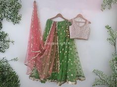 Custom made Lehenga Choli dupatta.  Plus size available at a small up-charge. Size: This is custom made outfit as per your size. Post your order we will send you a measurements reference sheet using which you can provide details required to make your outfit with best fit. Fabric and work: Lehenga - Embroidered net. Blouse - Embroidred brocade. Dupatta - Premium net Delivery time: This lehenga set will take 2-3 weeks to produce after we have received your sizing details. Don't worry it can be made sooner too, just keep us informed, we will process it accordingly and deliver on or before a delivery date we discuss. Disclaimer: Color may slightly vary due to digital photography and display screen settings. Laces and trims may change based on availability. shown in the picture. Fitted Sets With Gota Work For Designer Wear, Fitted Dola Silk Sets With Gota Work, Fitted Lehenga With Gota Work For Designer Wear, Fitted Designer Lehenga With Gota Work, Designer Fitted Lehenga With Gota Work, Anarkali Chanderi Lehenga With Self Design, Designer Green Choli With Dupatta, Fitted Green Dupatta For Diwali, Fitted Pista Green Salwar Kameez With Dori Work