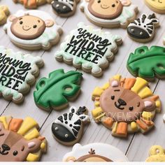 the cookies are decorated with different animals and words