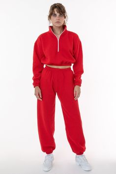 The Flex Fleece High Waist Sweatpant. This unisex pant features an adjustable drawstring and an elastic hem at the ankle. This fleece is soft and comfortable. Perfect for post workout, lounging at home or a trip to the grocery store. Pair with a bodysuit or crop top for a casual look or go bold with the matching Flex Fleece Half Zip Cropped Pullover. These sweatpants feature a high waist fit that accentuates your curves juxtaposed with a super baggy leg width. Constructed from 50% polyester and Bad Nun, Senior Dress, Monochrome Party, Red Tracksuit, Outfit Sporty, Red Sweatpants, La Outfits, Los Angeles Apparel, Ny Fashion