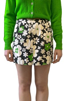 Please note that this item is final sale and cannot be returned or exchanged. See more in our Shipping and Returns page. VINTAGE SELECTED BY ANNA SUI Floral patterned skort. No size tag available, fits like XS. PRODUCT DETAILS Great Condition Style# V0424T40 CARE/IMPORT Dry clean only DIMENSIONS Waist: 25” Hips: 36” Inseam: 3” Outseam: 15” This is a previously loved vintage garment, and therefore supports the planet by promoting a circular system carrying a lighter carbon footprint. Retro Printed Bottoms For Spring, Printed Retro Bottoms, Retro Floral Print Bottoms For Spring, Vintage Printed Bottoms For Spring, Spring Vintage Fitted Mini Skirt, Vintage Fitted Mini Skirt For Spring, Fitted Floral Print Mini Skirt Shorts, Fitted Vintage Mini Skirt For Spring, Trendy Green Mini Skirt With Floral Print