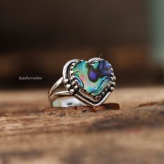 Abalone Shell Ring, Heart Shape Ring, 925 Sterling Silver Ring, Unique Ring, Handmade Ring, Silver Artisan Ring, Wedding, Gift For Her Metal: 925 Sterling Silver Gemstone : Abalone Shell  Stone Color : Multi Stone Shape : Heart Stone Setting: Bezel Benefits of wearing Rainbow moonstone:- Rainbow moonstone is thought to bring balance, harmony and hope while enhancing creativity, compassion, endurance and inner confidence. Rainbow moonstone is believed to help strengthen intuition and psychic perc Unique Heart Shaped Rings As A Gift, Unique Heart Shaped Rings For Gift, Unique Heart Shaped Jewelry For Promise, Unique Heart Shaped Promise Jewelry, Unique Heart-shaped Gift Rings, Unique Heart-shaped Promise Jewelry, Unique Sterling Silver Heart Ring, Unique Heart Ring For Anniversary, Elegant Handmade Heart Cut Rings